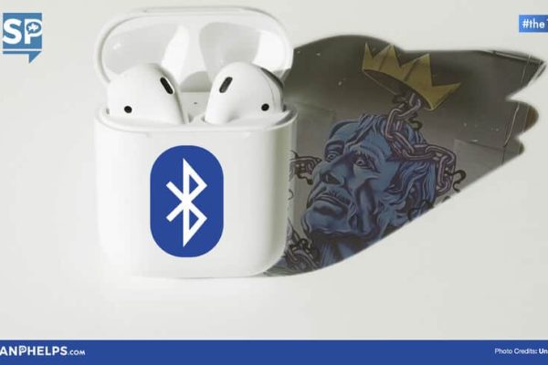 A pair of wireless earphones in a white case with a Bluetooth logo is casting a shadow of a stylized crowned head.